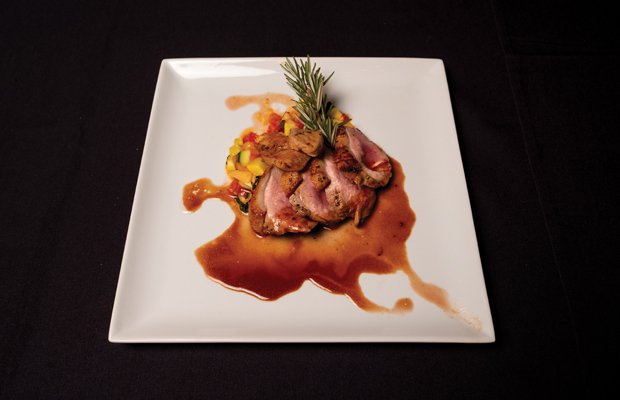 Roasted duck breast with seared  foie gras and mango salsa