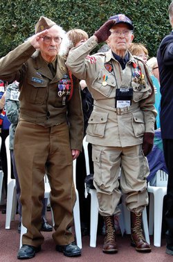 Bob Bearden and Robert Blatnik saluding Normandy on D Day.jpg.jpe
