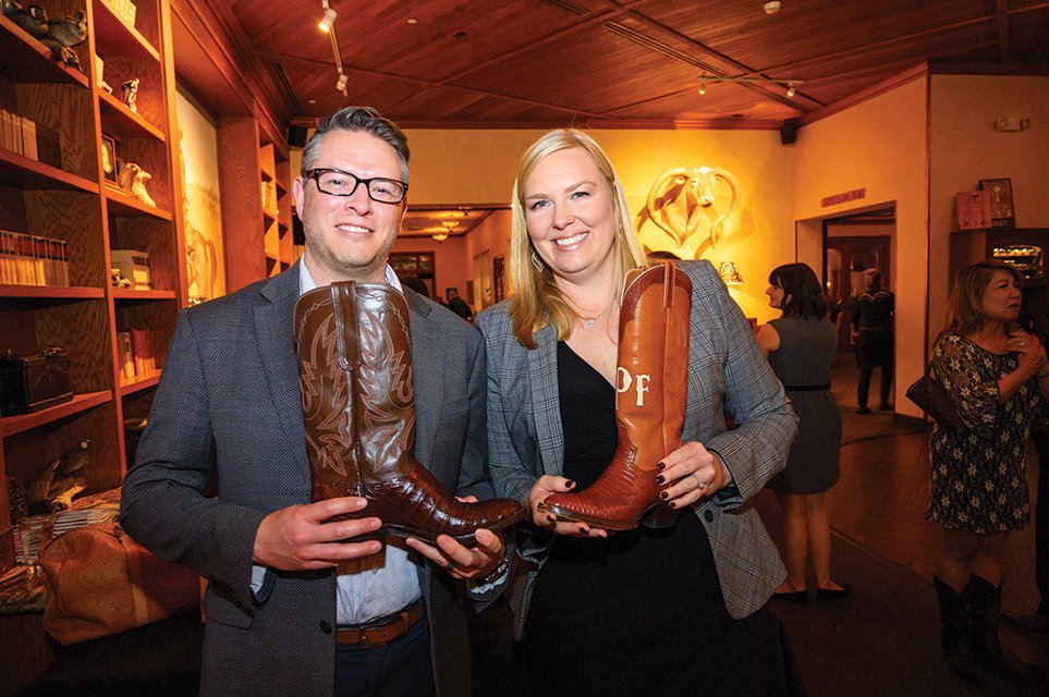 Ciccarino, Jason and Katie with raffle boots.jpg