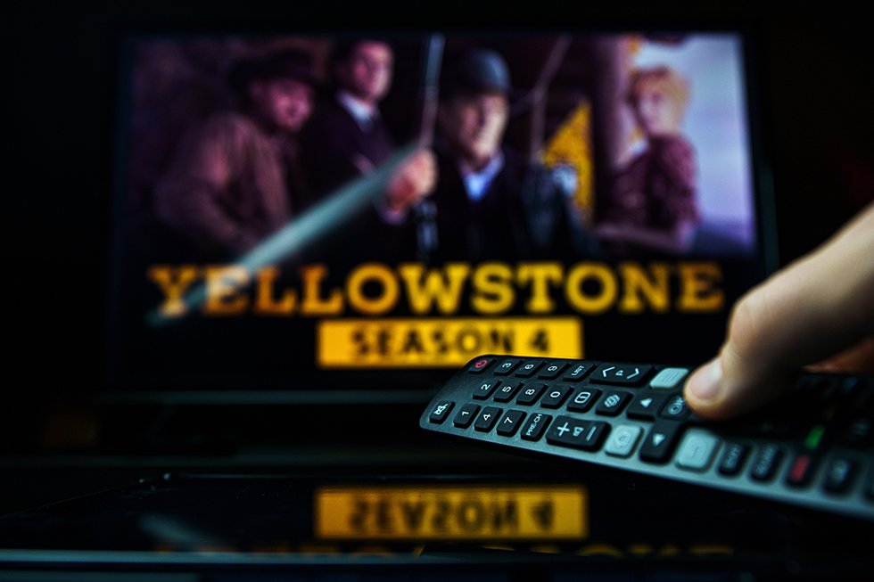 TV series Yellowstone and TV remote controler. TV show Yellowsto